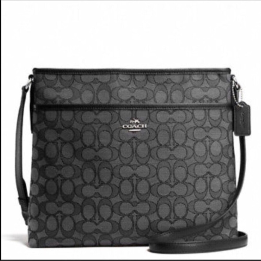 New. Coach signature file bag.
